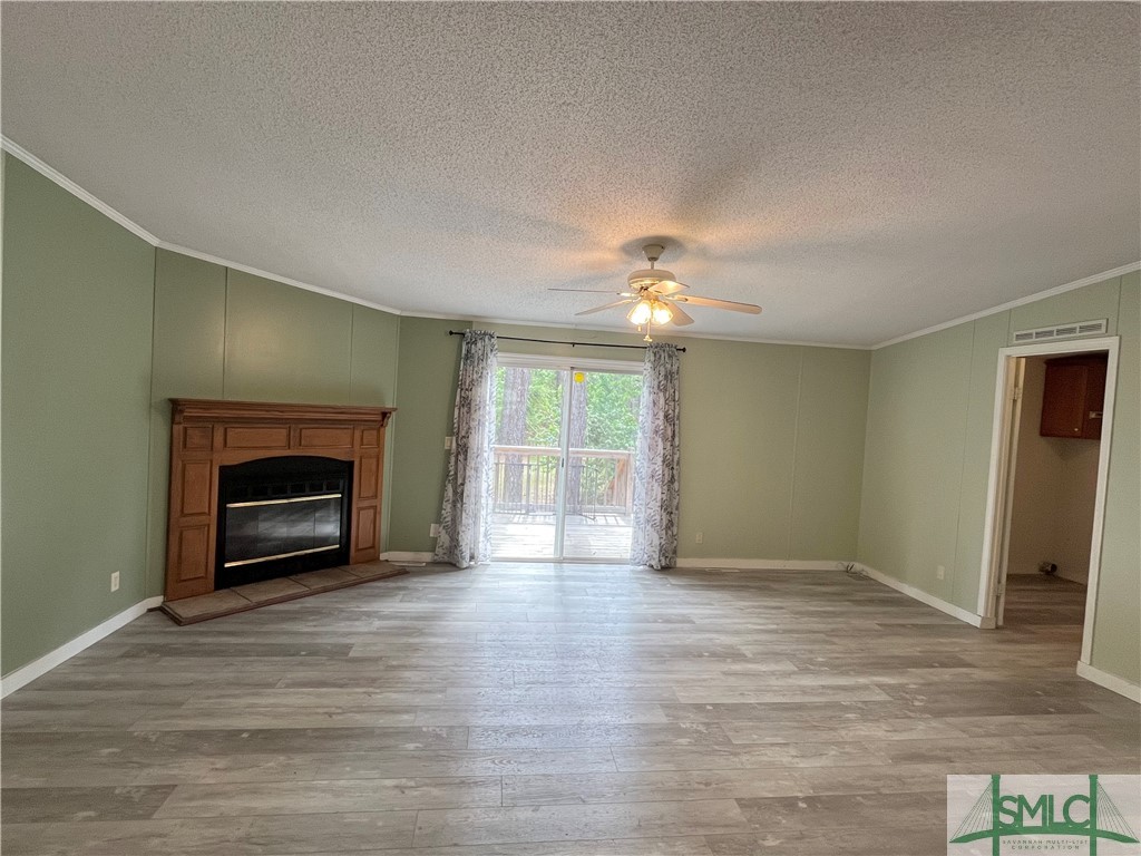 379 Beebe Road Springfield, GA 31329 - Photo 7 of 40 Great Room with Wood Burning Fireplace