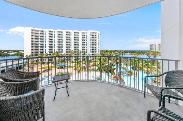 a reading room with furniture and a window