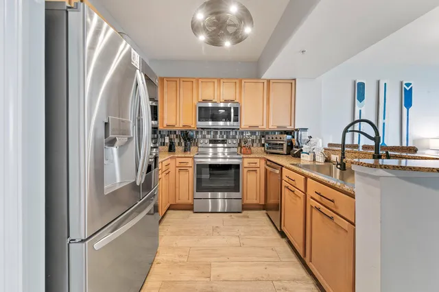 a view of a dining room with furniture and window