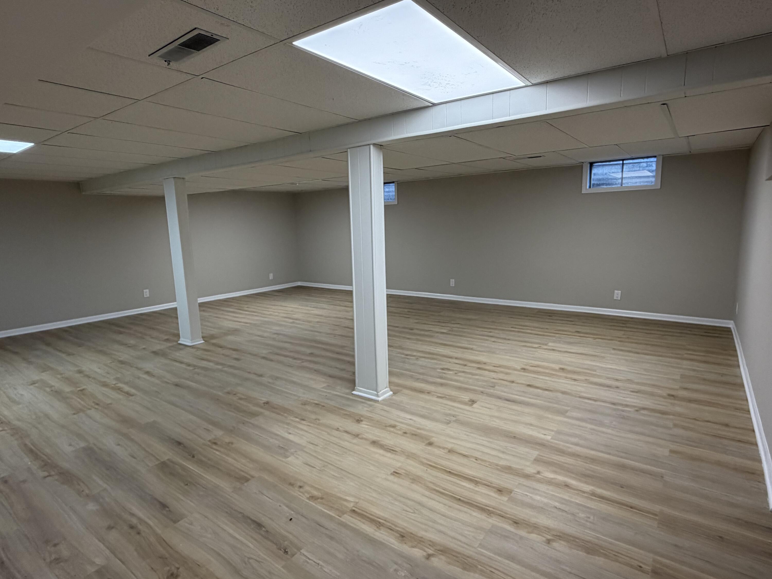 603 West 13th Street La Porte, IN 46350 - Photo 13 of 18 an empty room with wooden floor and closet