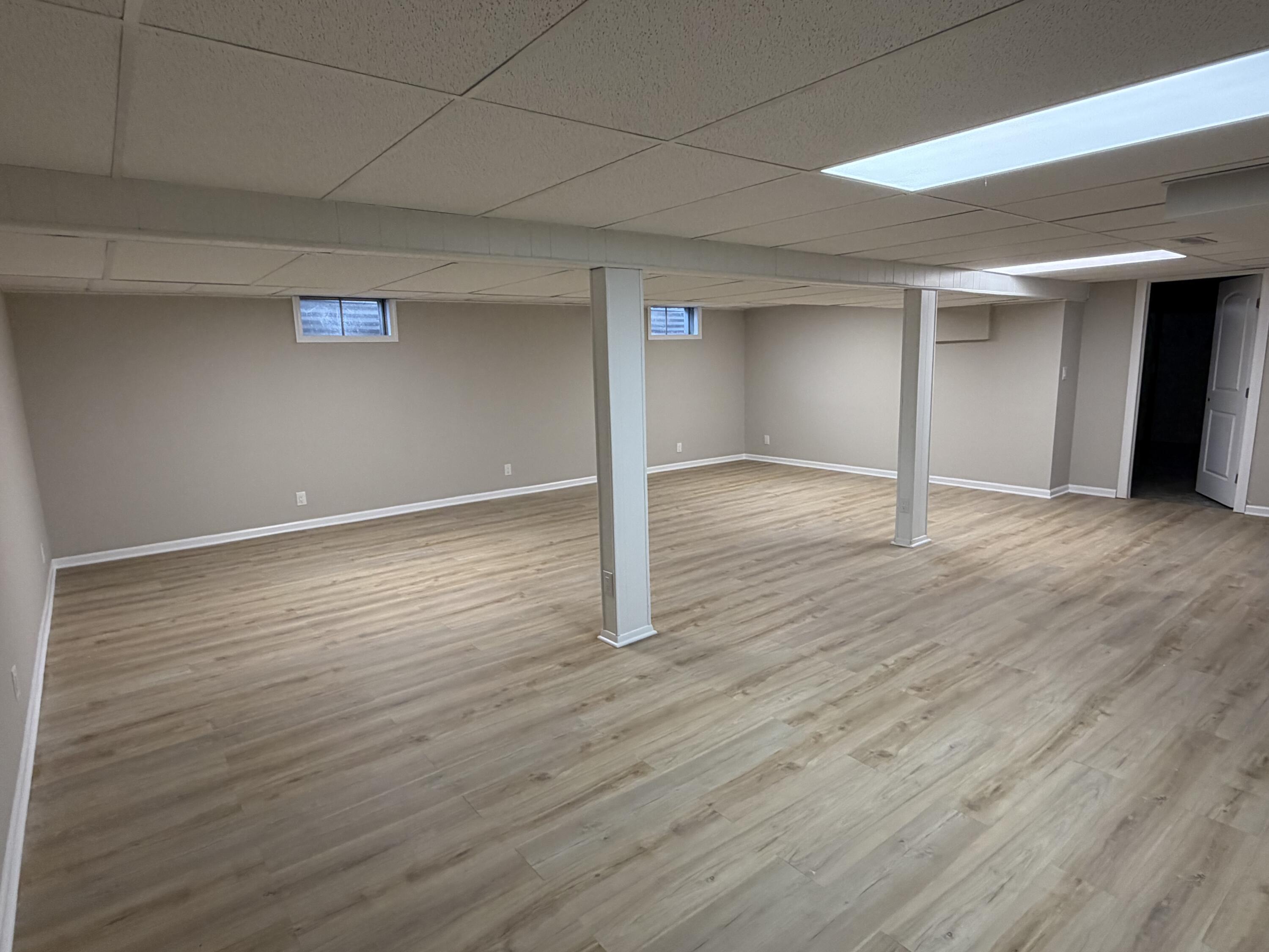 603 West 13th Street La Porte, IN 46350 - Photo 14 of 18 a view of an empty room with wooden floor