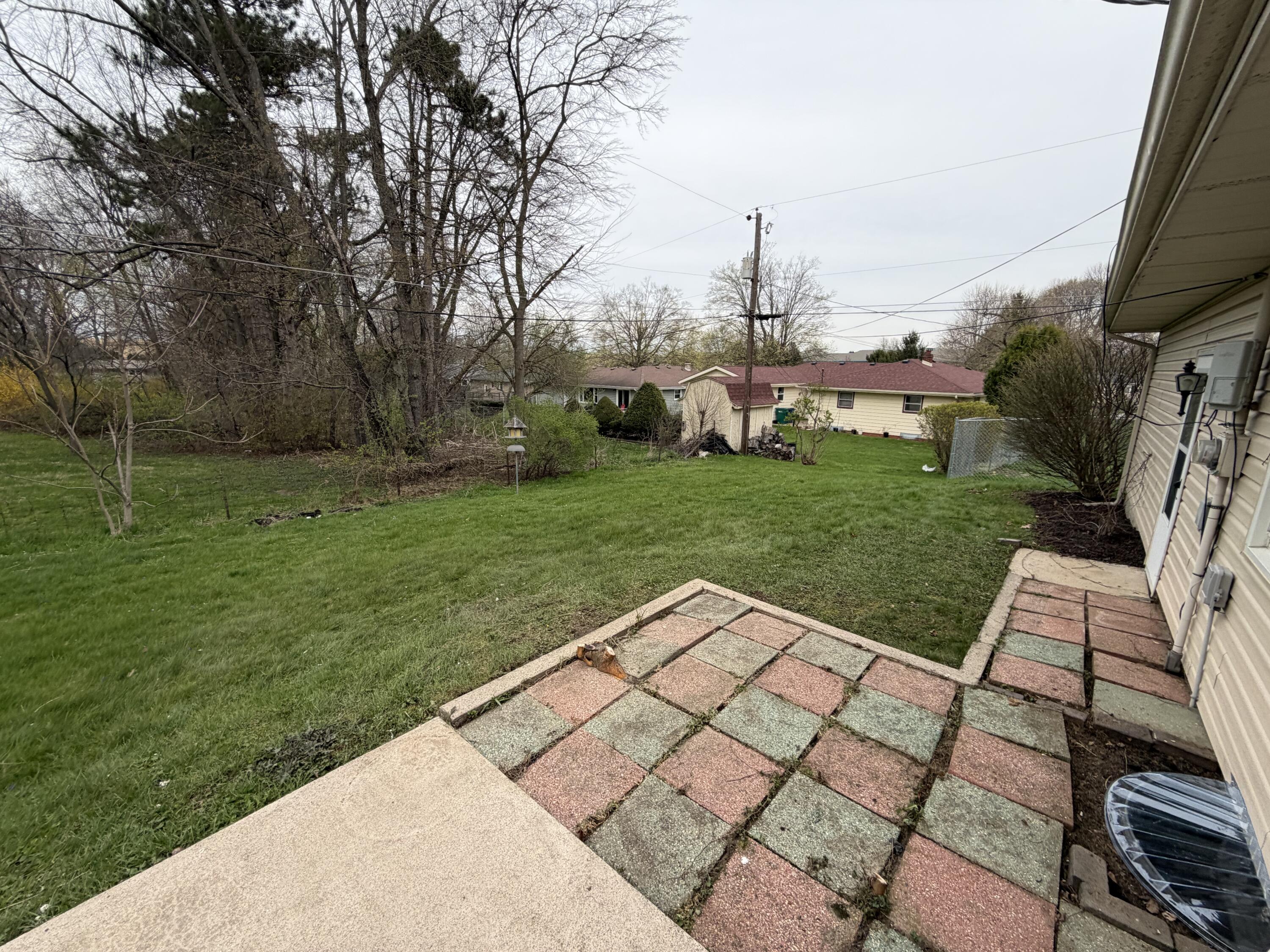 603 West 13th Street La Porte, IN 46350 - Photo 16 of 18 a view of a backyard with sitting area