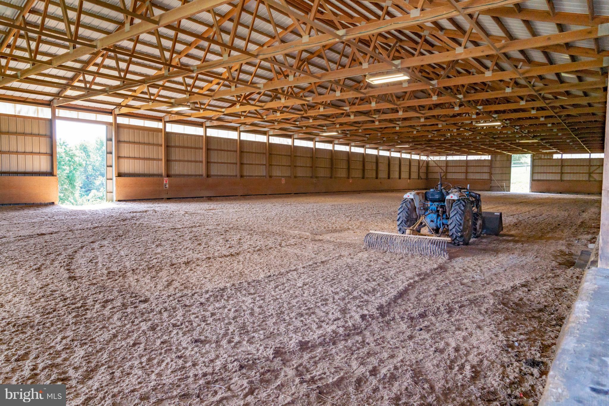 13431 Lewisdale Road Clarksburg, MD 20871 - Photo 4 of 27 Bright Indoor Arena with Dust Free Fibar Footing