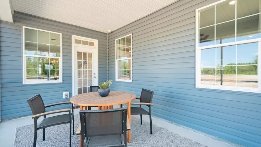 686 Conifer Dr Spring Hill Thompson's Station, TN 37179 - Photo 11 of 22 a dining room with furniture and windows