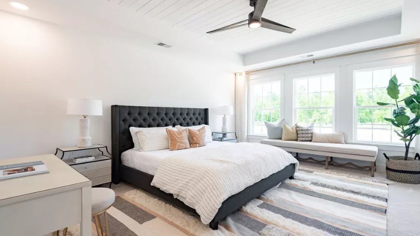 686 Conifer Dr Spring Hill Thompson's Station, TN 37179 - Photo 14 of 22 a bedroom with a large bed and a window