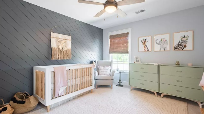 686 Conifer Dr Spring Hill Thompson's Station, TN 37179 - Photo 20 of 22 a bedroom with a bed and a chandelier