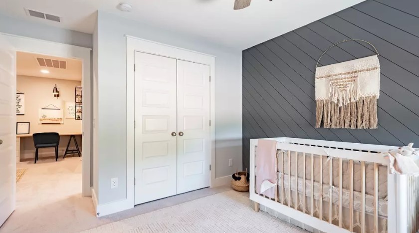 686 Conifer Dr Spring Hill Thompson's Station, TN 37179 - Photo 21 of 22 a bedroom with a bed and a window