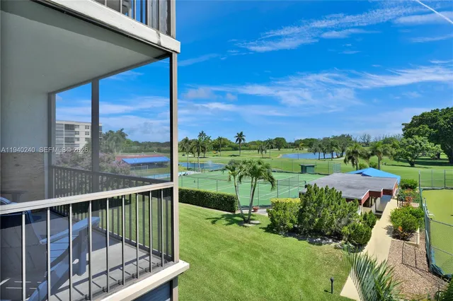 a view of a balcony with lake view and mountain view