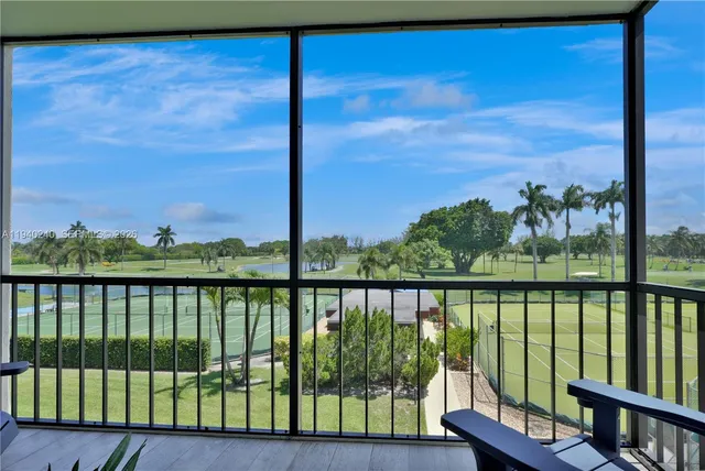 a view of a lake from a balcony