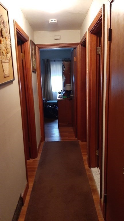 19 Glenmere Street Lowell, MA 01852 - Photo 4 of 12 a view of hallway with furniture and a window