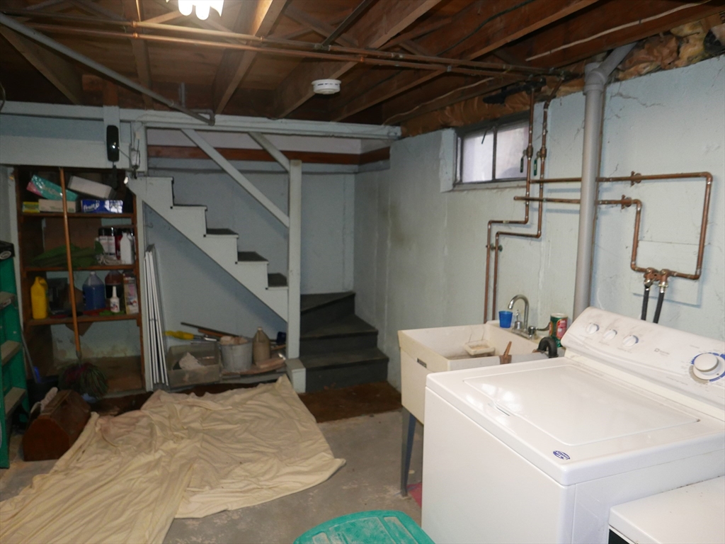 19 Glenmere Street Lowell, MA 01852 - Photo 10 of 12 a utility room with dryer and washer