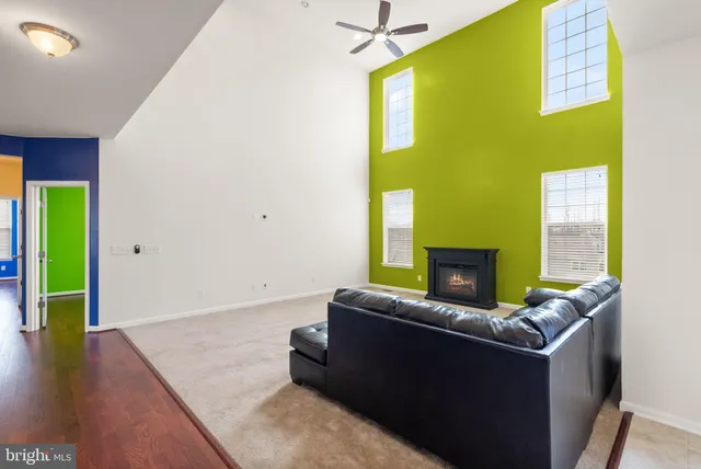 a view of a hallway with stairs