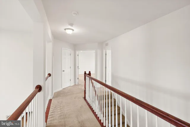 a bathroom with a sink double vanity granite tub shower and a mirror