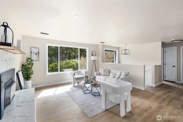 a dining room with furniture and windows