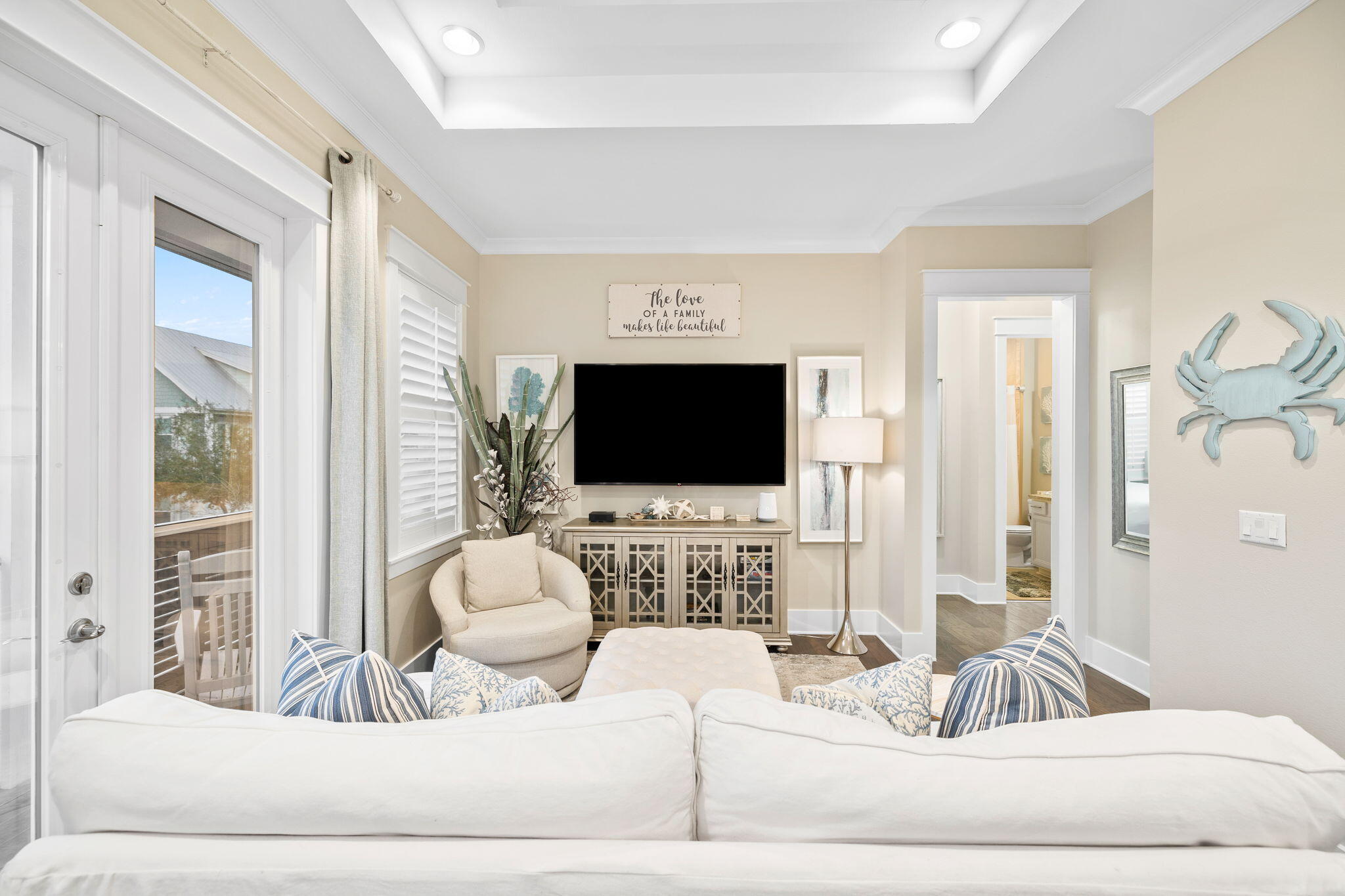67 Milestone Dr Inlet Beach, Unit C Inlet Beach, FL 32461 - Photo 21 of 39 a living room with furniture and a flat screen tv