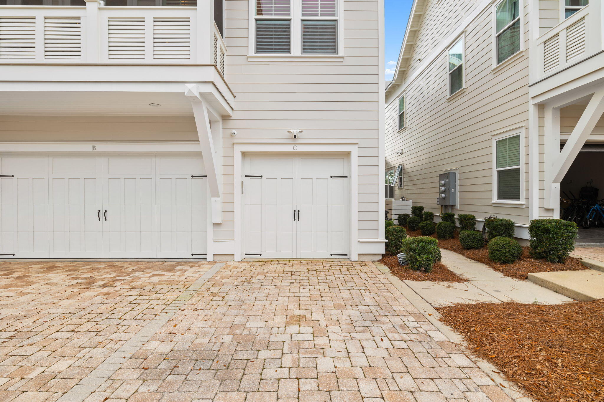 67 Milestone Dr Inlet Beach, Unit C Inlet Beach, FL 32461 - Photo 6 of 39 a view of a house with a wooden bench