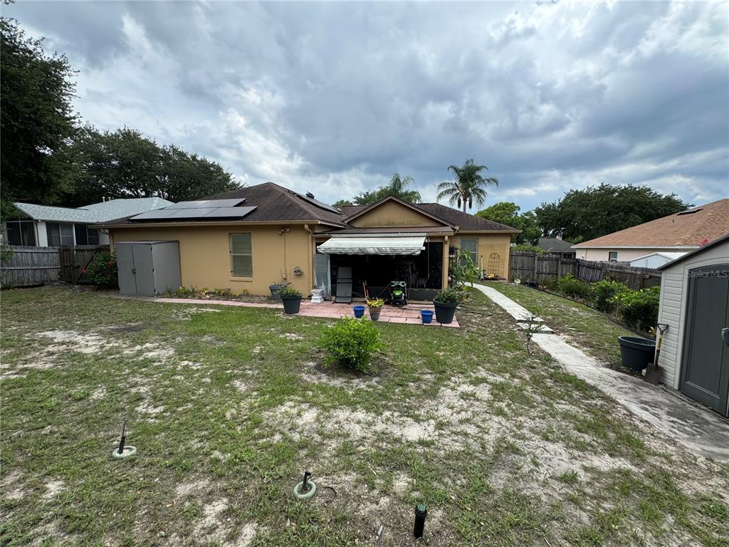 686 Park Valley Circle Minneola, FL 34715 - Photo 28 of 33 a front view of house with yard and green space