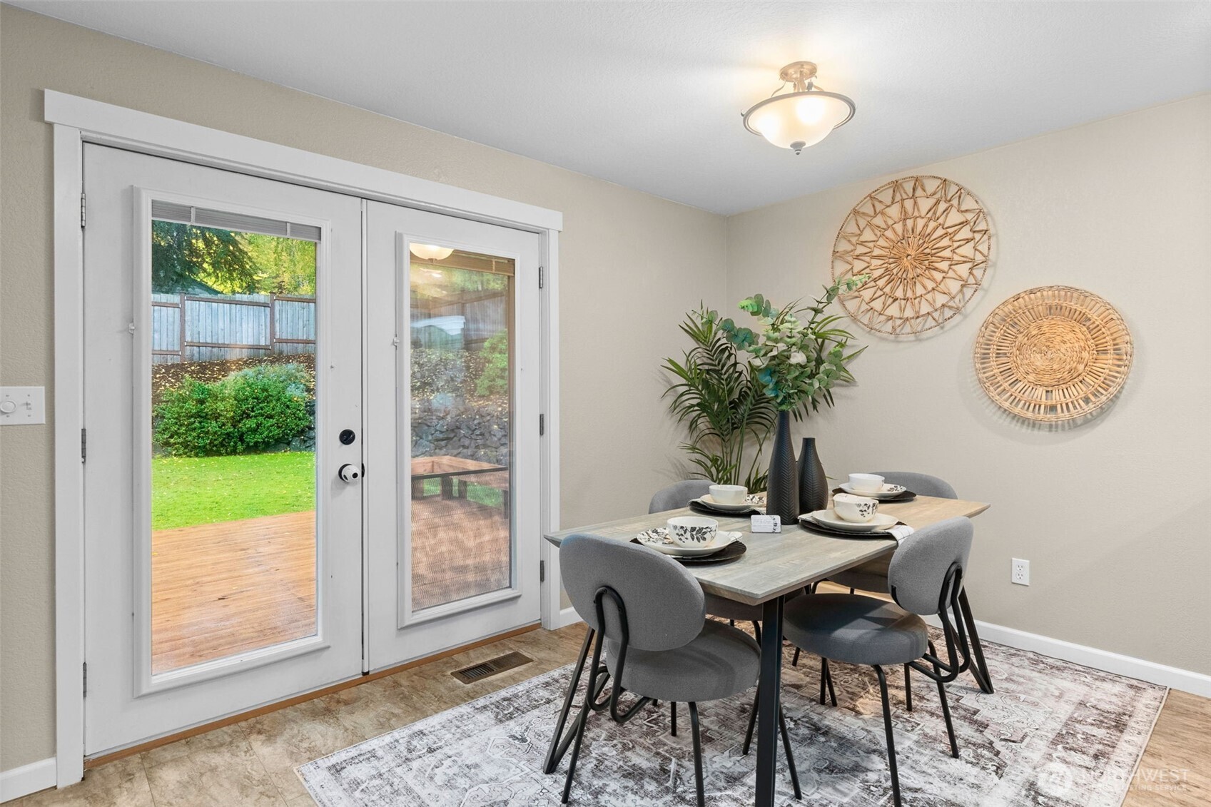 615 Clark Street Southwest Tumwater, WA 98512 - Photo 14 of 27 a view of a dining room with furniture window and wooden floor