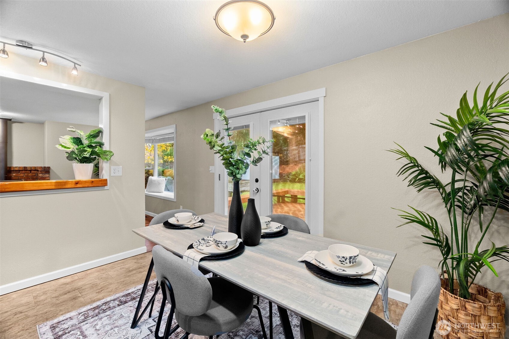 615 Clark Street Southwest Tumwater, WA 98512 - Photo 15 of 27 a view of a dining room with furniture and chandelier