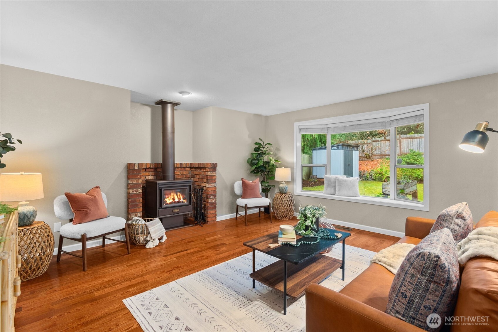 615 Clark Street Southwest Tumwater, WA 98512 - Photo 16 of 27 a living room with furniture and a fireplace