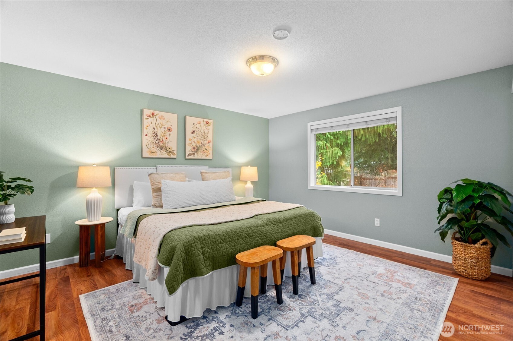 615 Clark Street Southwest Tumwater, WA 98512 - Photo 19 of 27 a bedroom with a bed and window