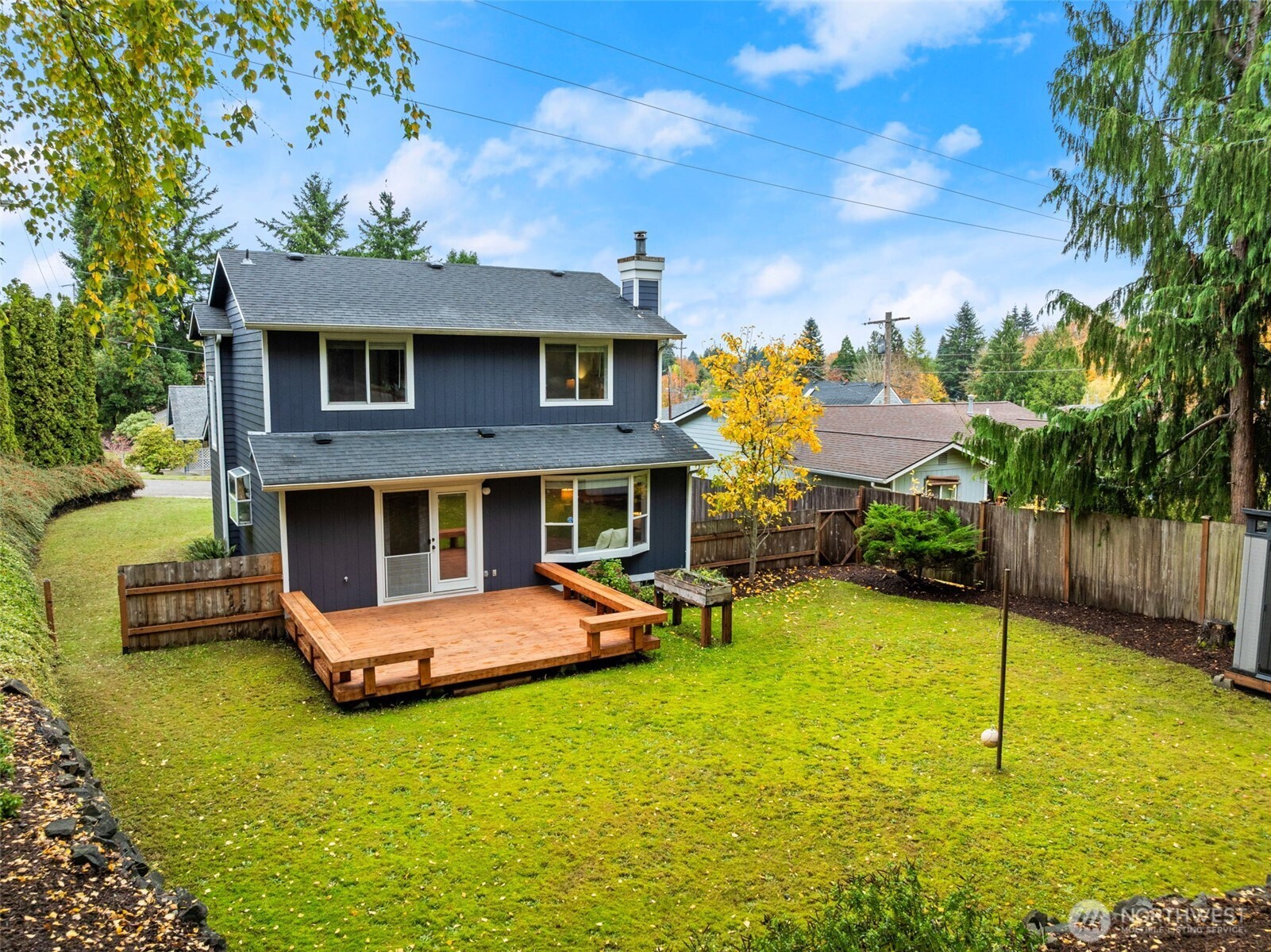 615 Clark Street Southwest Tumwater, WA 98512 - Photo 25 of 27 a view of a house with a yard patio and fire pit
