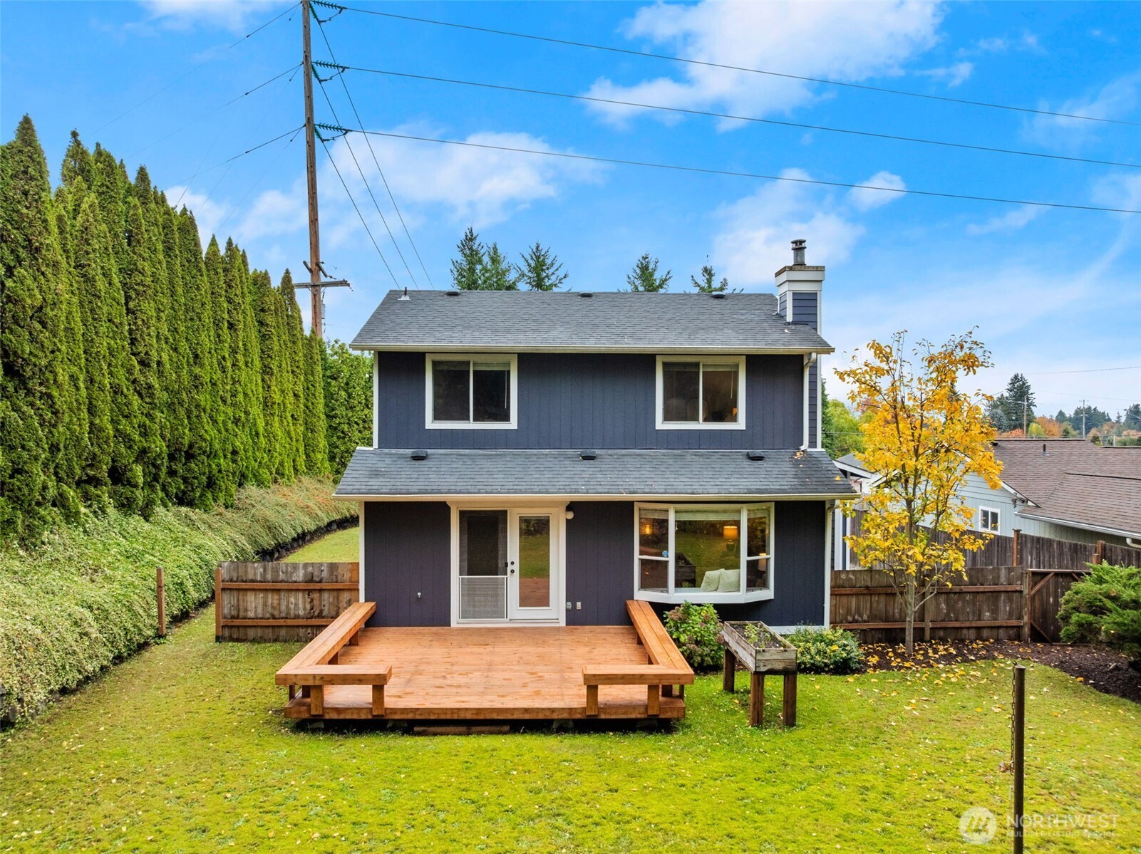 615 Clark Street Southwest Tumwater, WA 98512 - Photo 26 of 27 a front view of a house with swimming pool