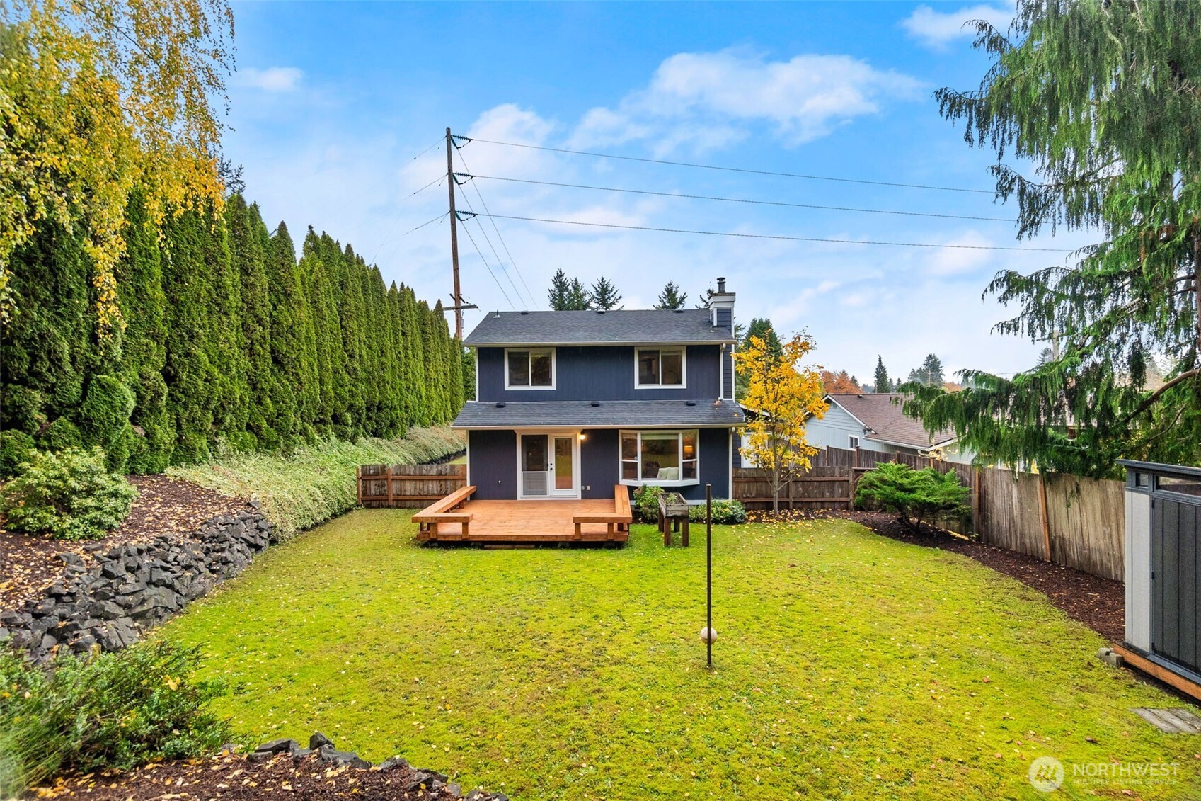 615 Clark Street Southwest Tumwater, WA 98512 - Photo 3 of 27 a view of a house with a yard patio and swimming pool