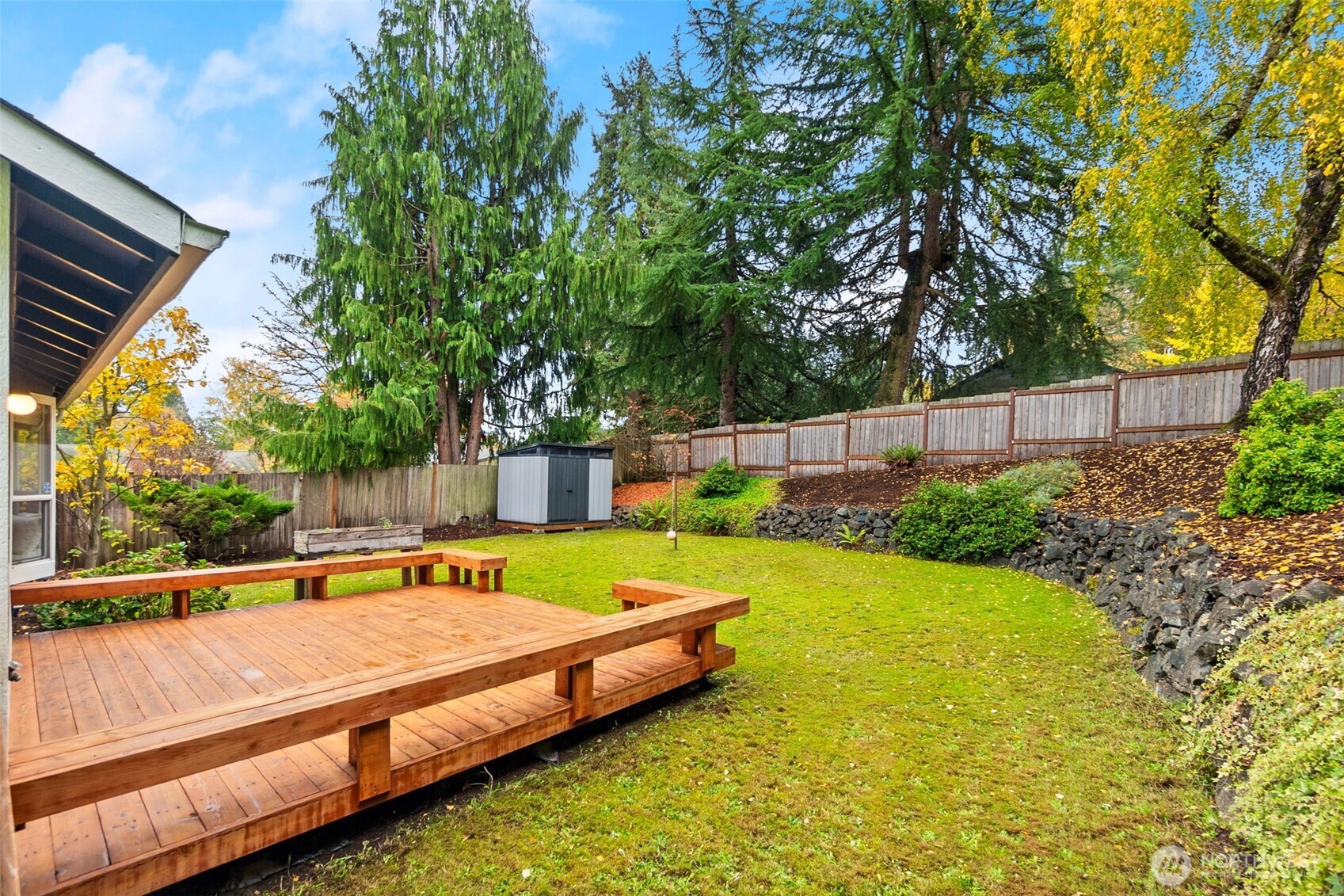 615 Clark Street Southwest Tumwater, WA 98512 - Photo 5 of 27 a view of a backyard with swimming pool