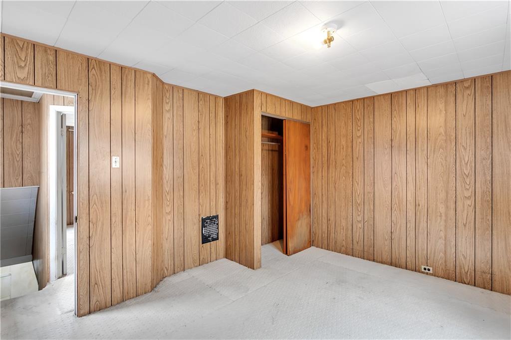 304 Beech Street Vandergrift, PA 15690 - Photo 17 of 25 a view of a room with a wooden door