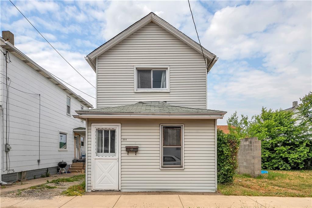 304 Beech Street Vandergrift, PA 15690 - Photo 23 of 25 a view of a house with a yard