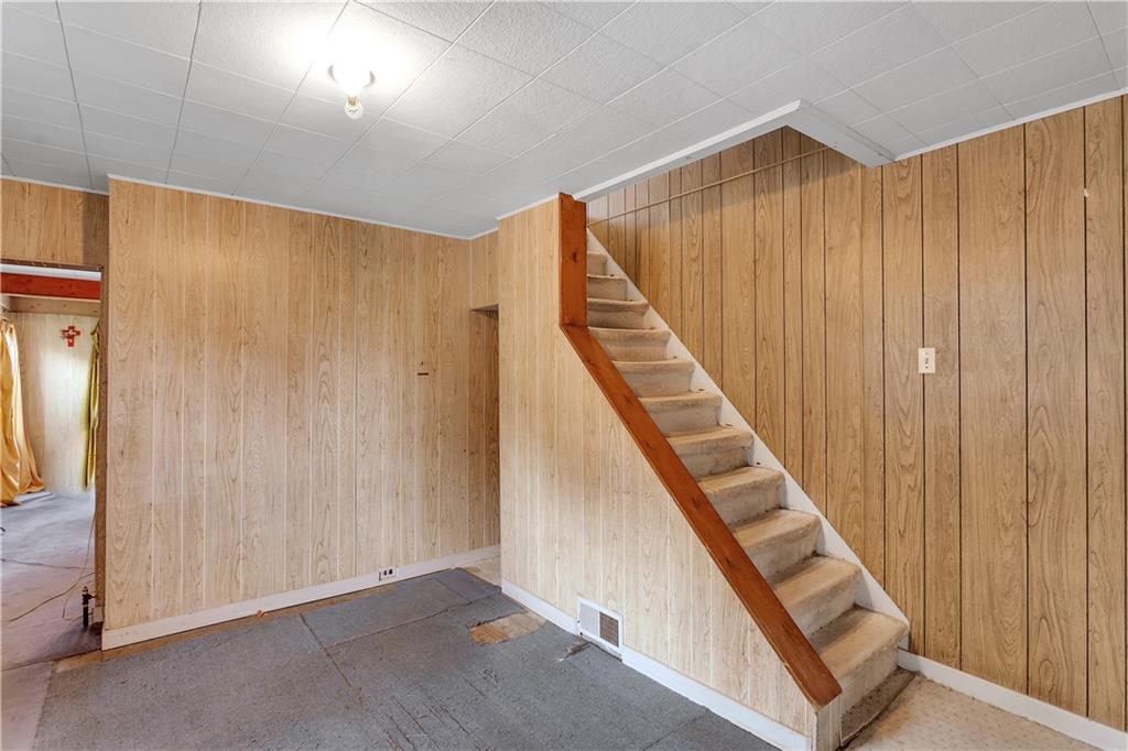 304 Beech Street Vandergrift, PA 15690 - Photo 10 of 25 a view of a hallway with staircase