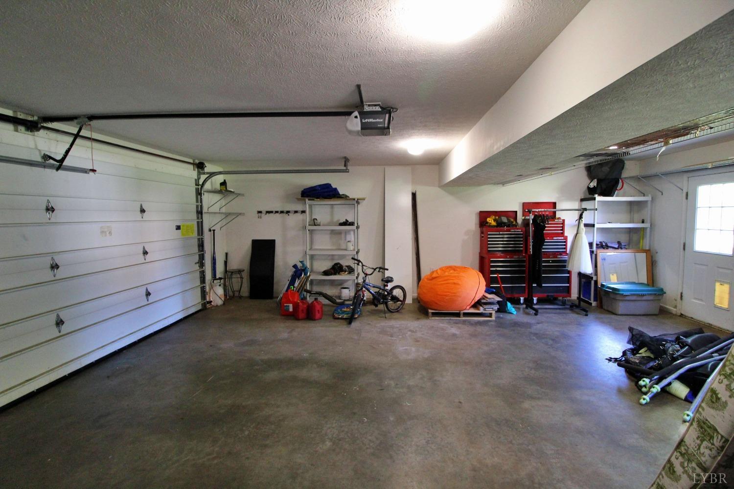 2899 Thomas Jefferson Road Forest, VA 24551 - Photo 19 of 22 a view of a garage with a table and chairs