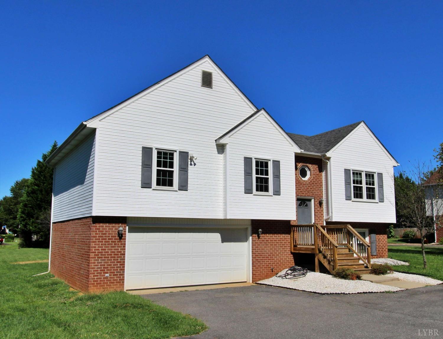 2899 Thomas Jefferson Road Forest, VA 24551 - Photo 2 of 22 a view of a white house with a yard
