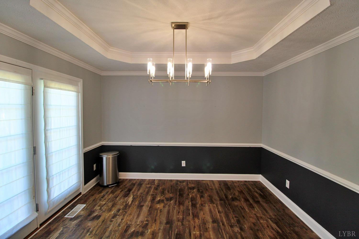 2899 Thomas Jefferson Road Forest, VA 24551 - Photo 3 of 22 a view of a livingroom with wooden floor and a window