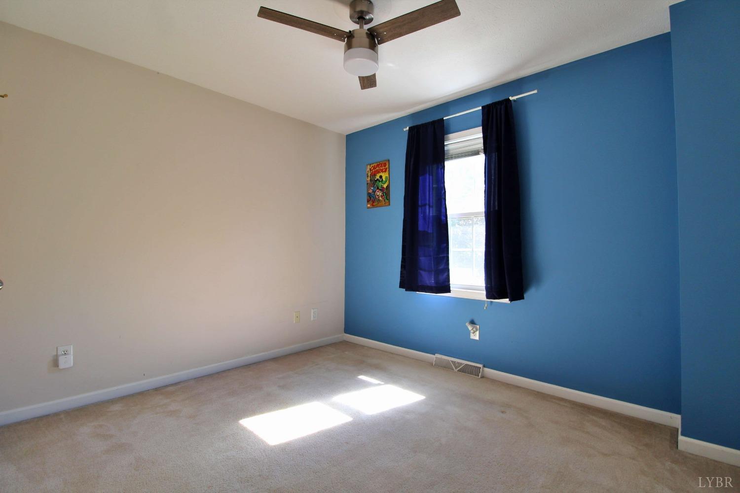 2899 Thomas Jefferson Road Forest, VA 24551 - Photo 10 of 22 an empty room with windows