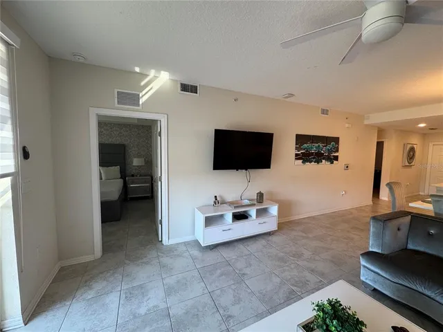 a living room with furniture and a window