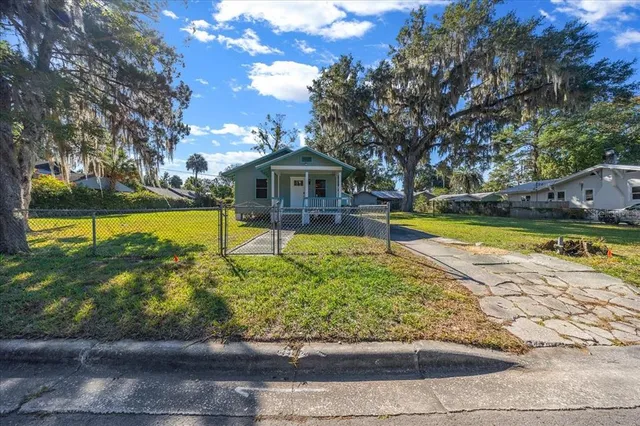 a front view of a house with swimming pool