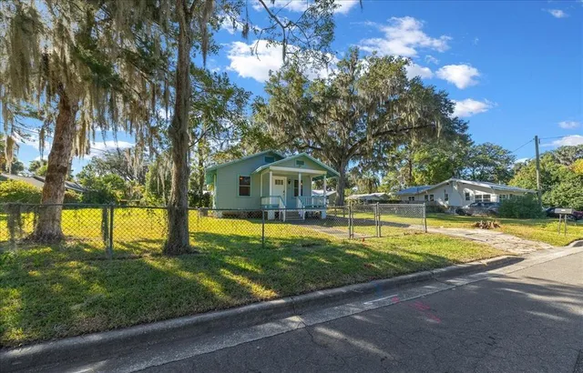 a view of a house with swimming pool