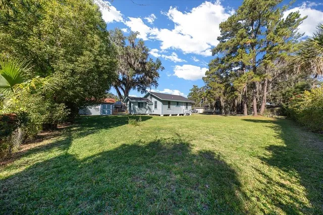 a view of house with garden