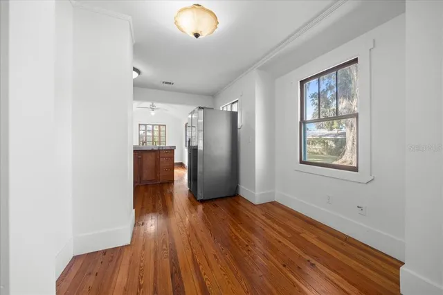 a view of entryway with wooden floor