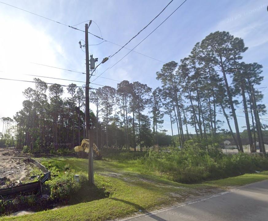 2265 Cortez Road Jacksonville, FL 32246 - Photo 11 of 11 a view of a yard in front of the house