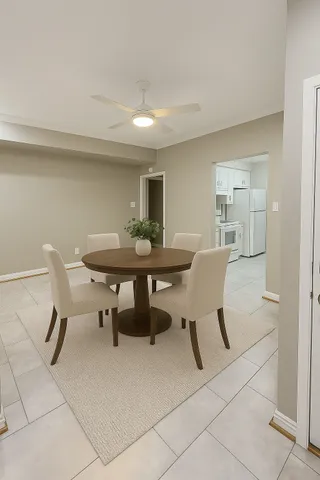 a view of an empty room with wooden floor fireplace and a window