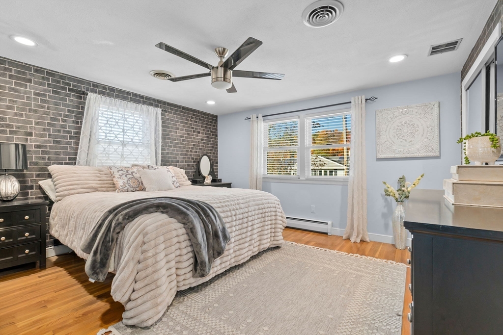 6 Susan Drive Saugus, MA 01906 - Photo 17 of 34 a spacious bedroom with a bed and window