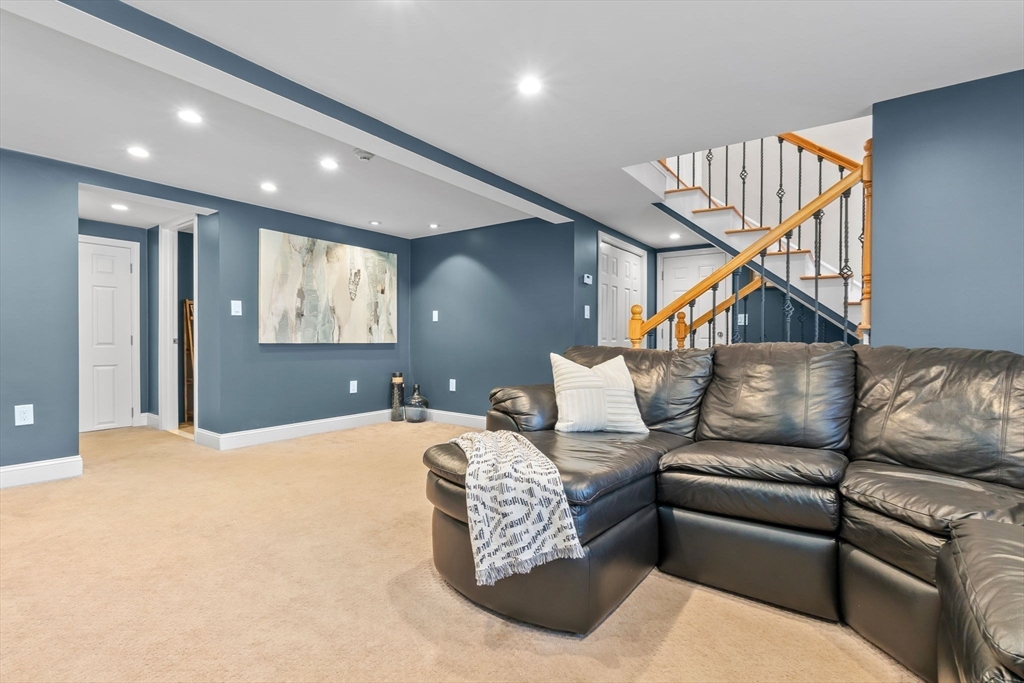 6 Susan Drive Saugus, MA 01906 - Photo 26 of 34 a living room with furniture and a ceiling fan