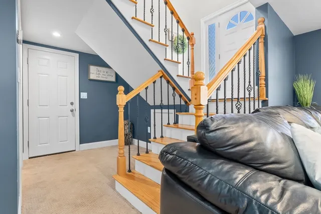 a bedroom with bed and a window