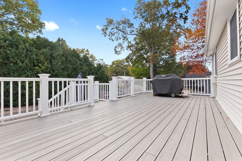6 Susan Drive Saugus, MA 01906 - Photo 31 of 34 a view of deck with wooden floor and fence