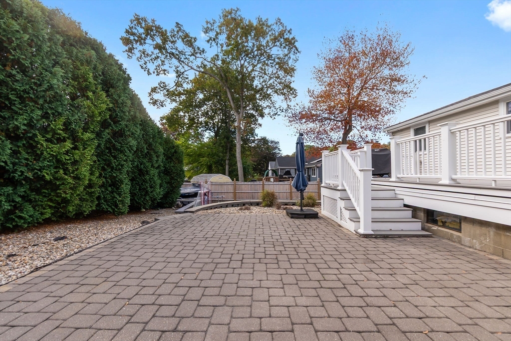6 Susan Drive Saugus, MA 01906 - Photo 32 of 34 a view of a backyard with a large tree