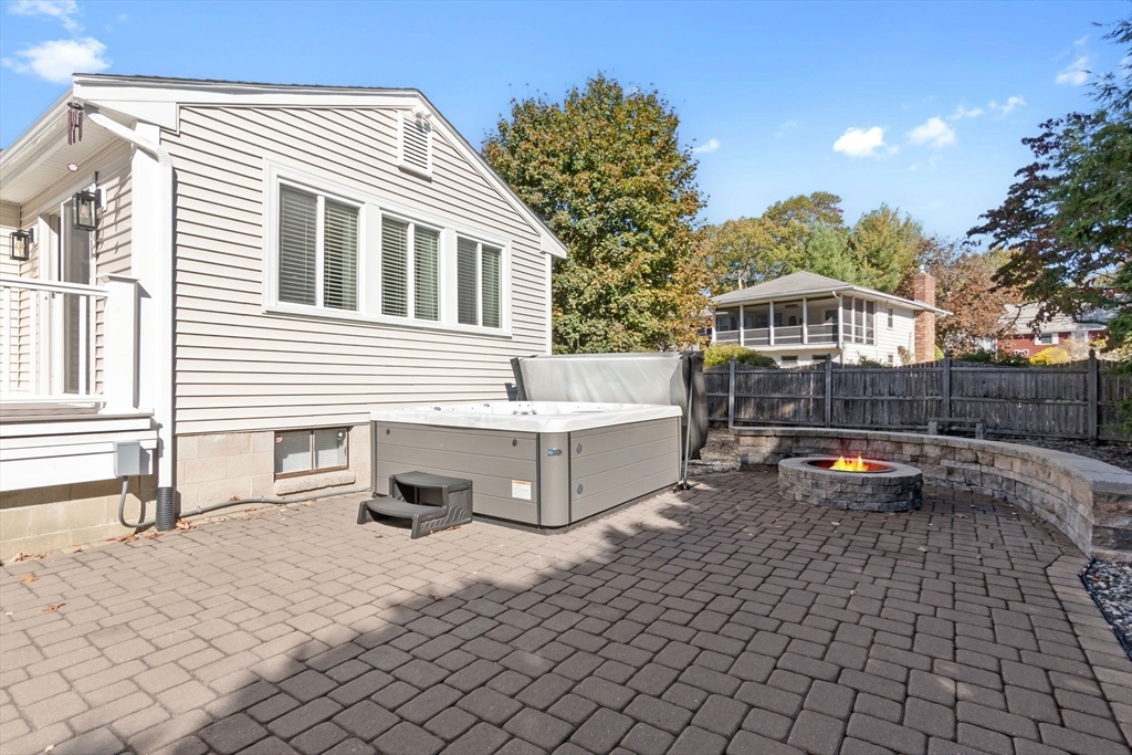 6 Susan Drive Saugus, MA 01906 - Photo 33 of 34 a backyard of a house with barbeque oven table and chairs