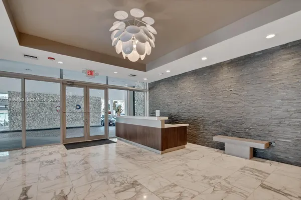 a view of a livingroom with furniture